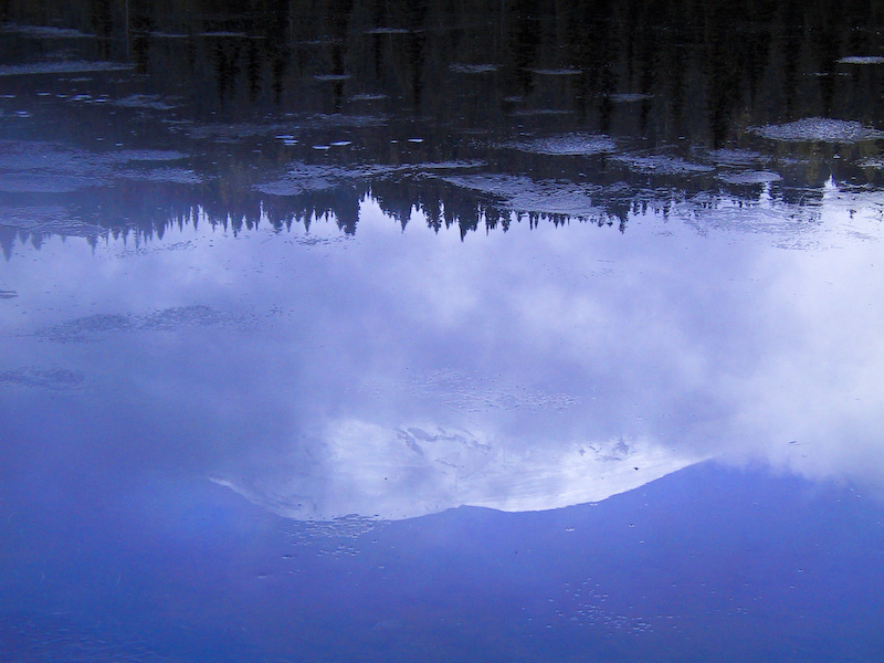 Reflection Of Mount Rainier In Ice Covered Reflection Lake
